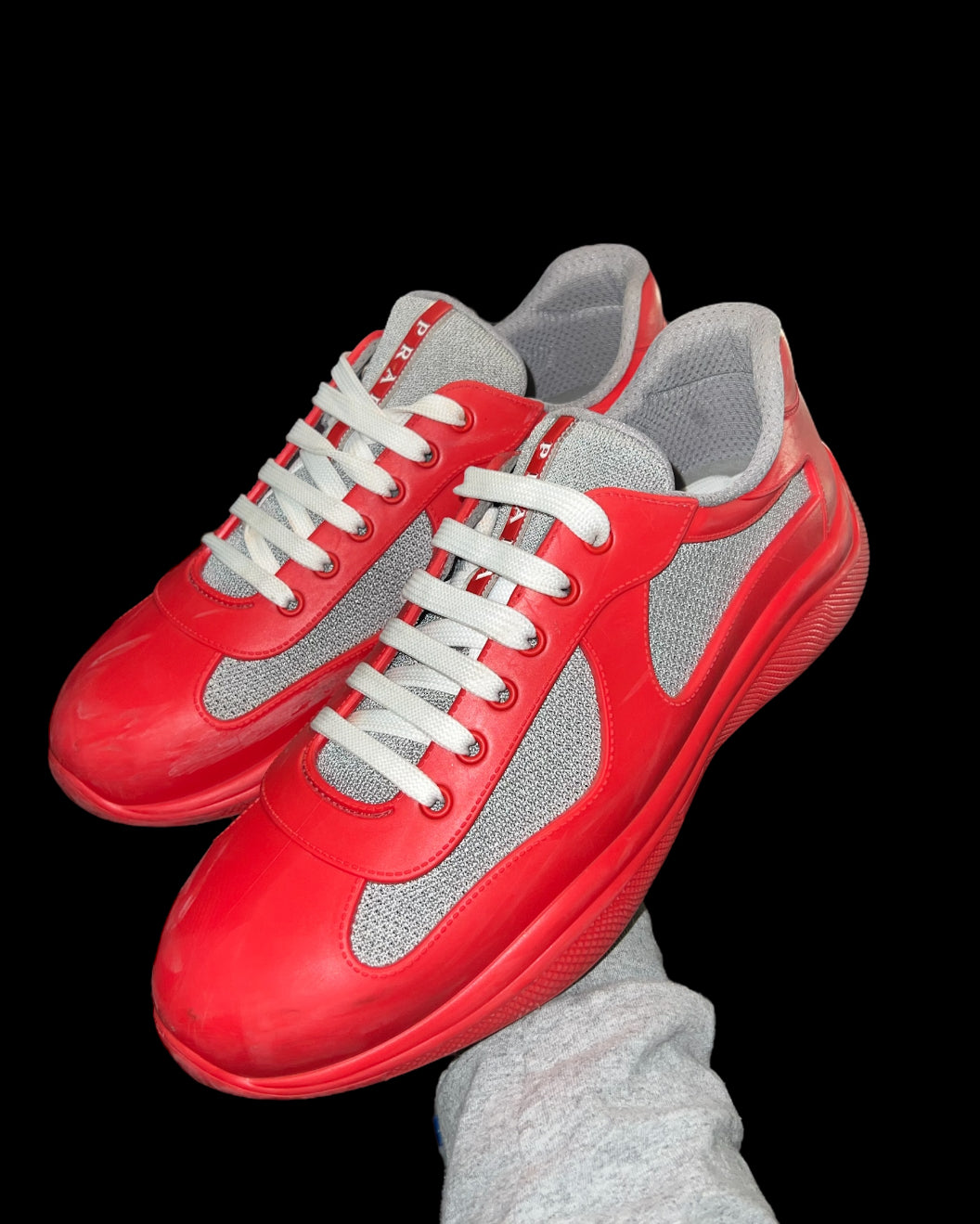 Preowned Red Rubber Prada America’s Cups size 44 (fits 11-11.5)