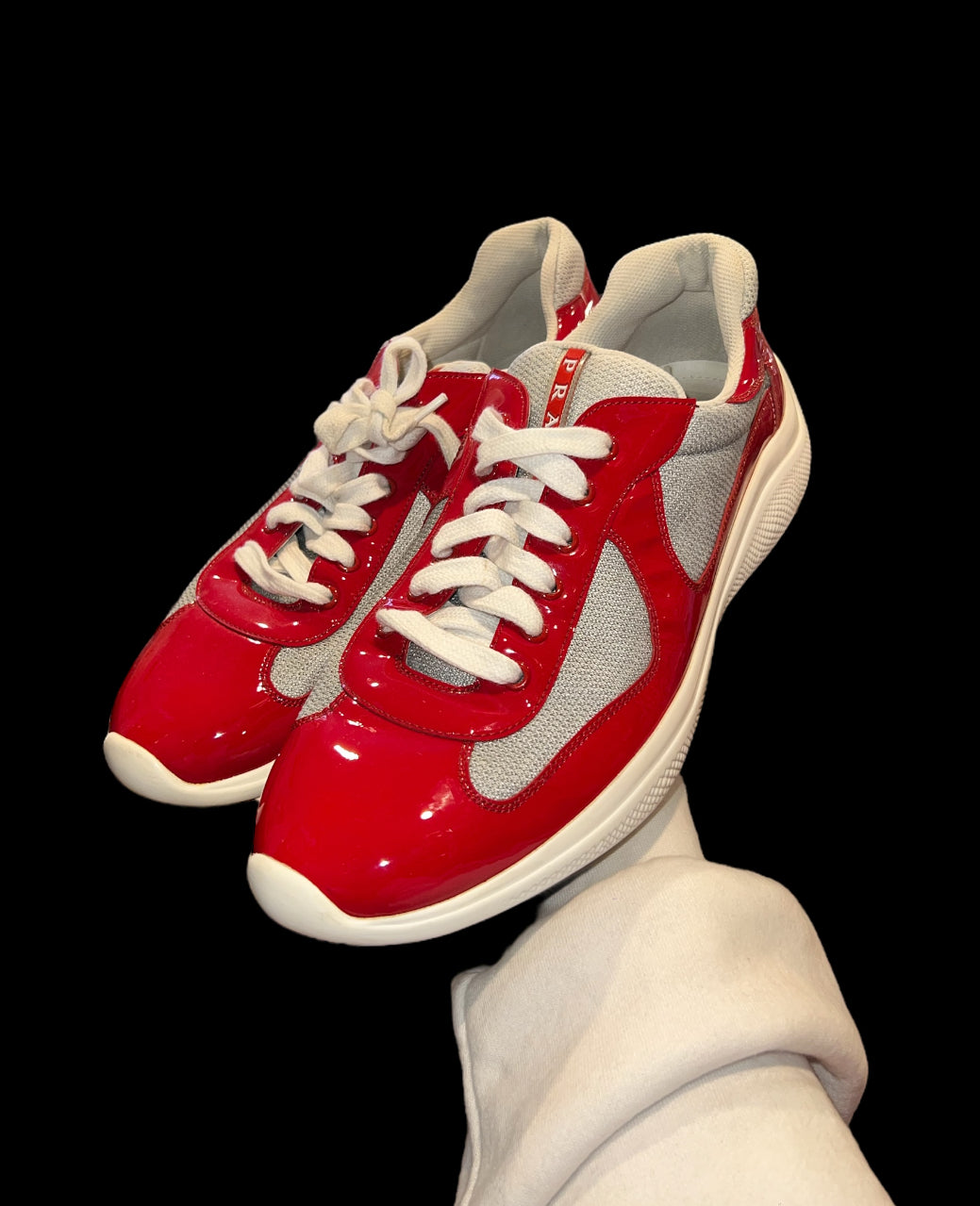 Preowned Red Prada America’s Cups size 11 (fits 12-13)