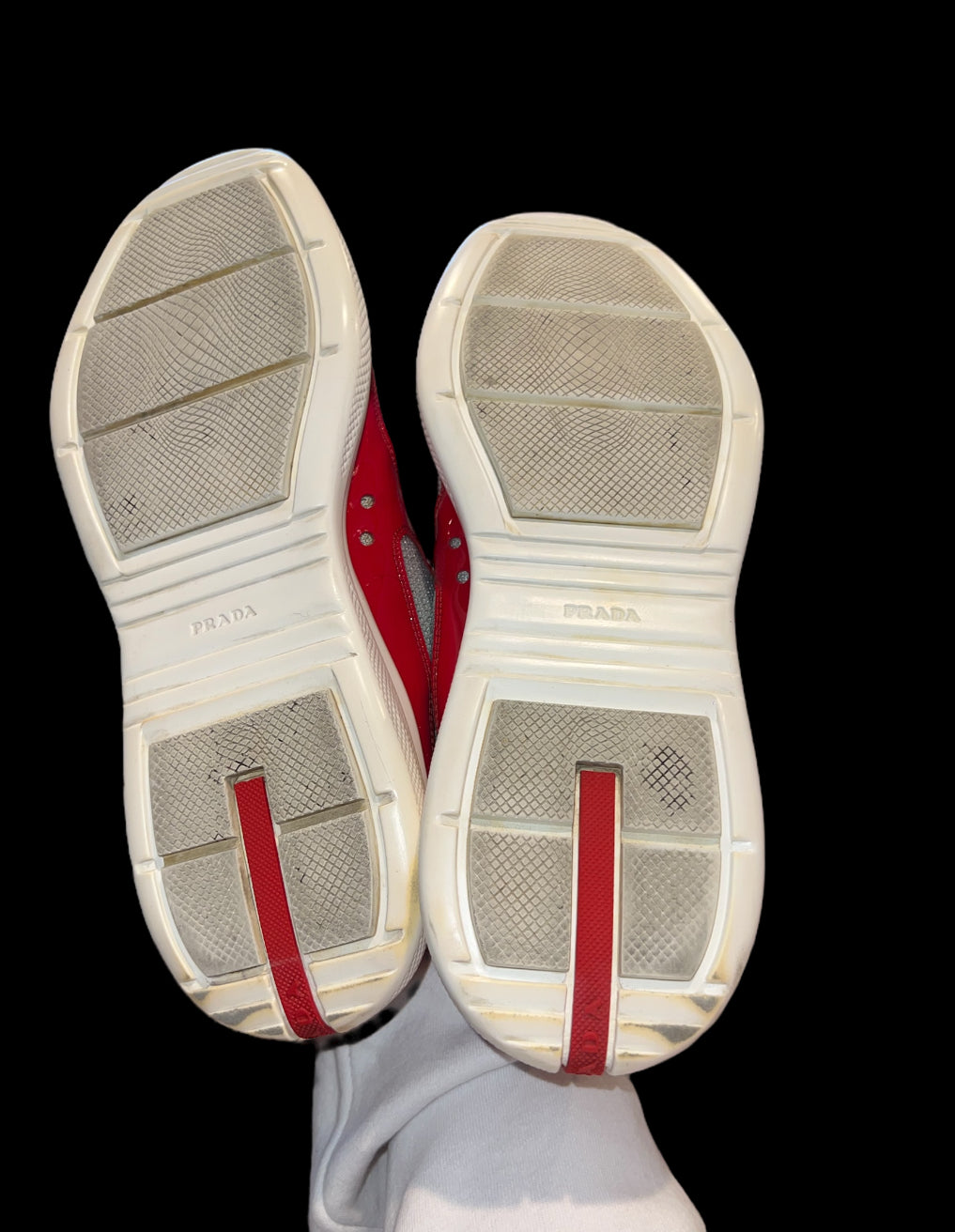Preowned Red Prada America’s Cups size 11 (fits 12-13)