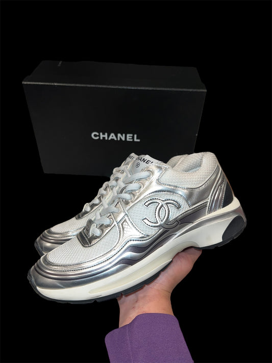 Preowned Silver Chanel Runners size 37.5 (fits 7.5W-8W)